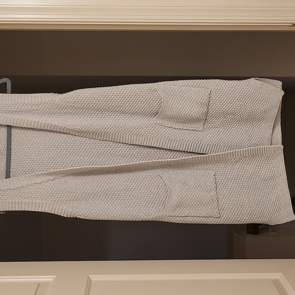 A grey knit long vest